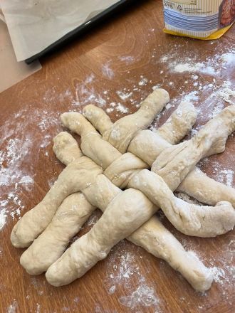 Challah braiding. Photo: Chana Swanström