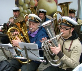 Brass players performing.